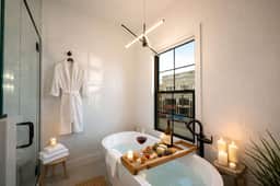 Onyx | Luxury Executive Loft Overlooking Main | Vibrant Fireplaces, King Bed
