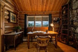 Clear Creek Crossing | Mountain Cabin on the Creek with Private Bridge Entry, BLM Land, Stargazing Deck + Separate Garage Apartment | Buffalo Wyoming Near Bighorn Mountains