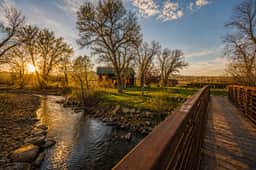 Clear Creek Crossing | Mountain Cabin on the Creek with Private Bridge Entry, BLM Land, Stargazing Deck + Separate Garage Apartment | Buffalo Wyoming Near Bighorn Mountains