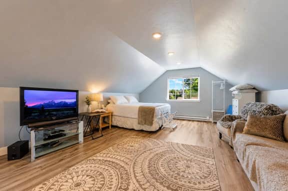 The Carriage Loft | Quiet Sheridan WY Retreat by Kendrick Park | King Bed, Queen Sleeper Sofa, Fast WiFi, Dedicated Workspace, Free Parking, Independent A/C + Heat | Walk to Downtown, Main Street & Big Goose Creek | Self Check-In, Managed by Wyo Stays
