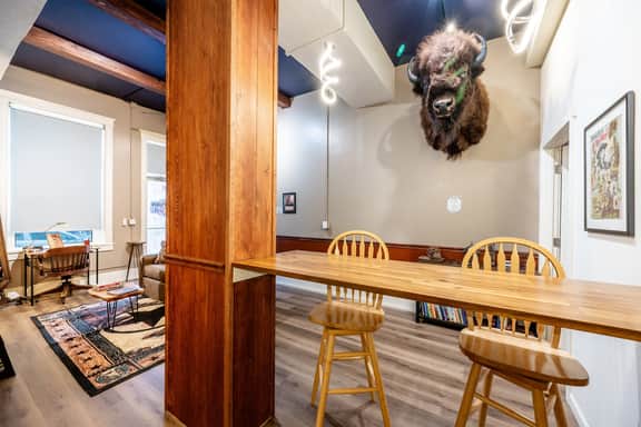Buffalo Bill Hideout | Historic 1895 Western Retreat in Downtown Sheridan Wyoming | Queen Bed, Smart TV, Free Parking & EV Charger | Walkable to Main Street Shops, Dining & Nightlife
