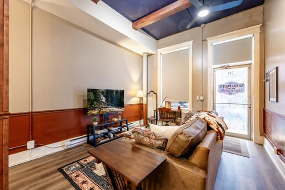 Buffalo Bill Hideout | Historic 1895 Western Retreat in Downtown Sheridan Wyoming | Queen Bed, Smart TV, Free Parking & EV Charger | Walkable to Main Street Shops, Dining & Nightlife